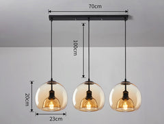 Three pendant ceiling lights with a black frame and clear glass shades, with dimensions.