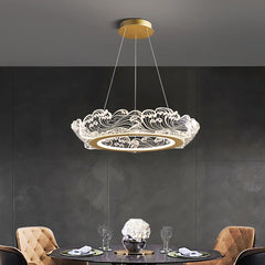 Adjustable crystal ring lighting adding elegance to an open hotel lobby