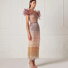 A full-length shot of the formal dress, highlighting its unique ankle-length cut.