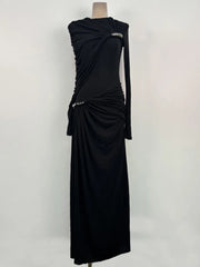 Full-length view showing the ankle-grazing hem and sleek fit, styled minimally for a modern formal look with clean lines.