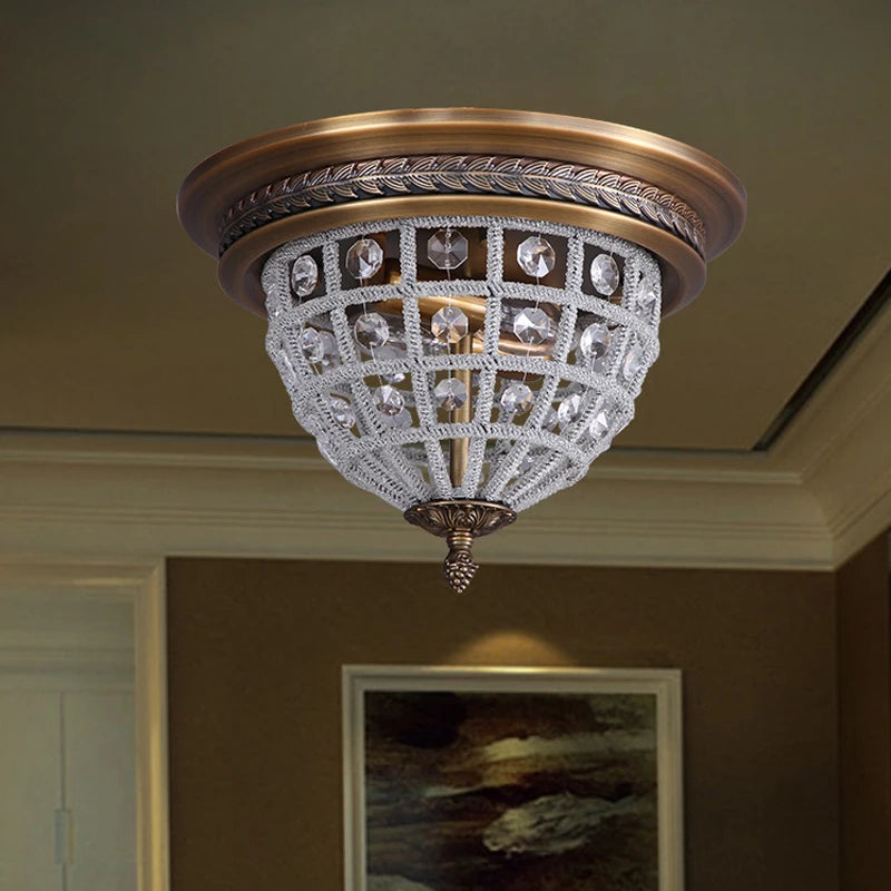 Antique bronze crystal dome flush ceiling lamp in elegant room setting