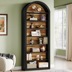 tall white arched bookshelf with open shelves and storage cabinet
