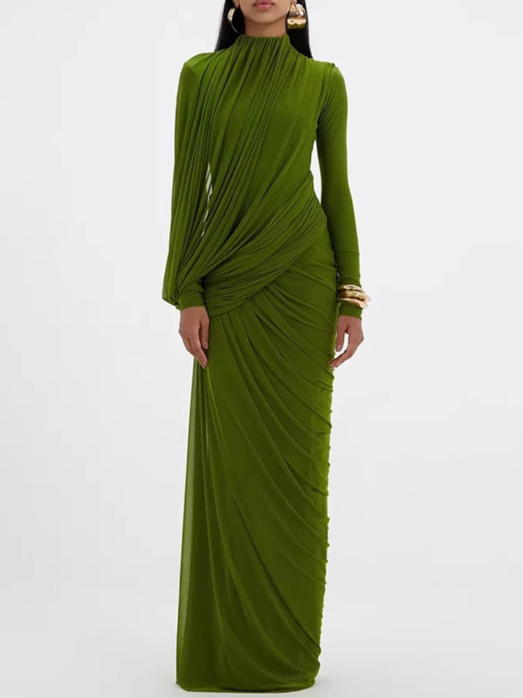 Close-up of the asymmetrical draping across the bodice, showing wrap-style folds that contour the waist and create a sculpted finish.