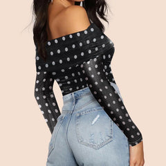 Slim fit off shoulder polka dot top styled with jeans