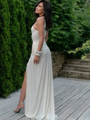 Back view of white floor-length dress with sculpted waist design