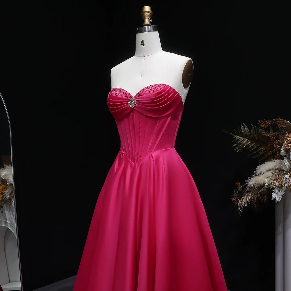 Backless A-line evening dress with flowing satin skirt