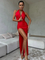 A close-up shot of the swinging collar and the high-split detail on the dress.