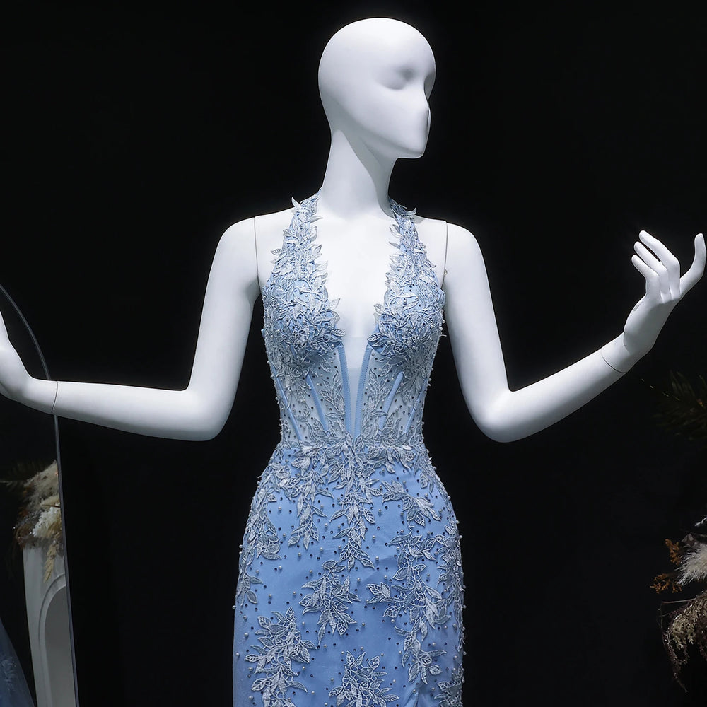 Formal mermaid gown with halter neckline and embroidered beadwork