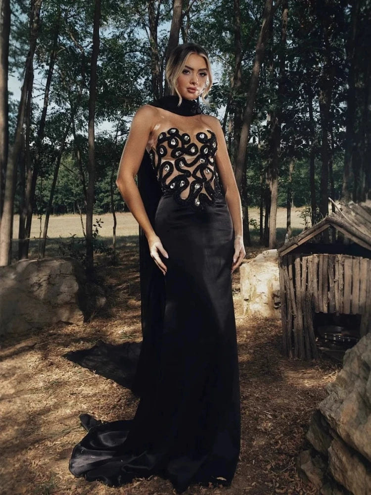 Backless ankle-length bandage gown with diamond embellishments