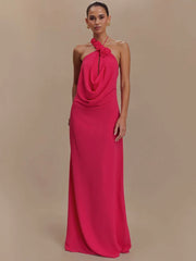 Backless pink formal dress styled for elegant parties and galas