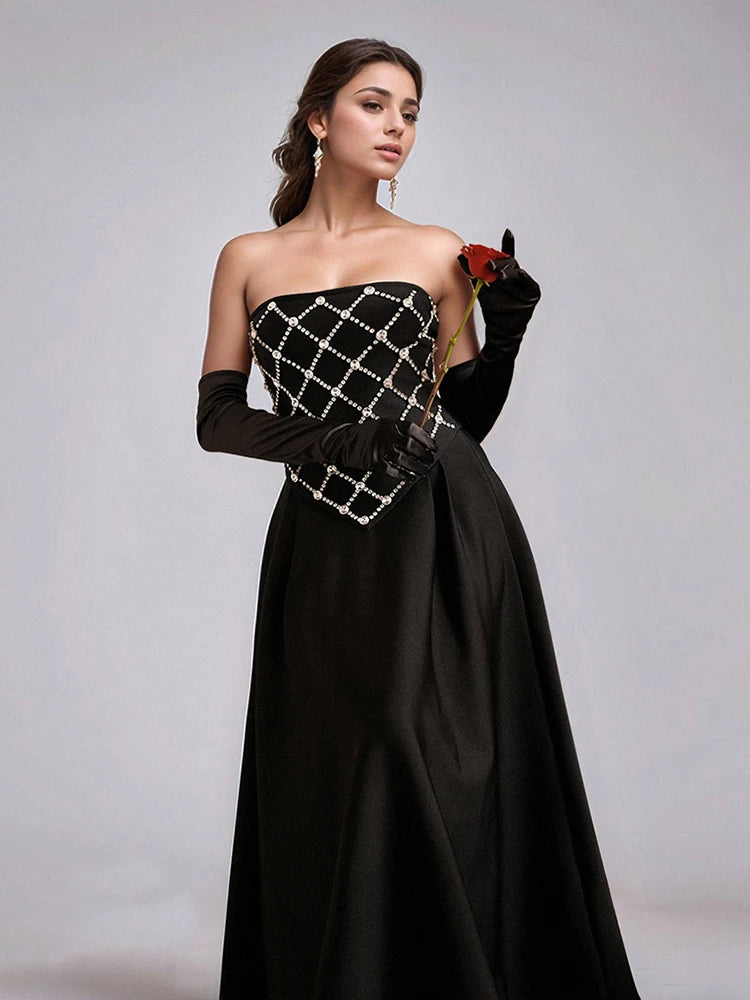 Backless sleeveless evening dress with diamond embellishments