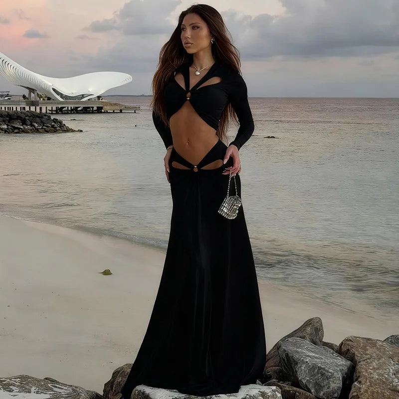 Full-length black crop top and maxi skirt co-ord set with an elastic waist skirt, styled for vacation evenings.