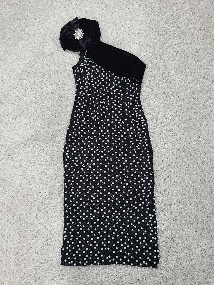 Beaded black polka dot dress worn as unique formal eveningwear