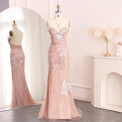 A close-up shot of the intricate beading on the strapless bodice of the dress.