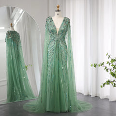 A full-length shot of the beaded tulle evening dress, highlighting the delicate cape.