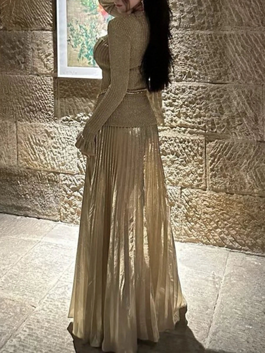 Ankle-length A-line dress featuring a belted high waist detail