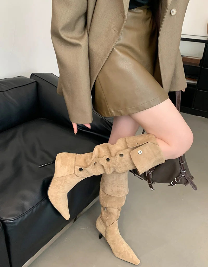 Beige flock knee-high fashion boots styled indoors