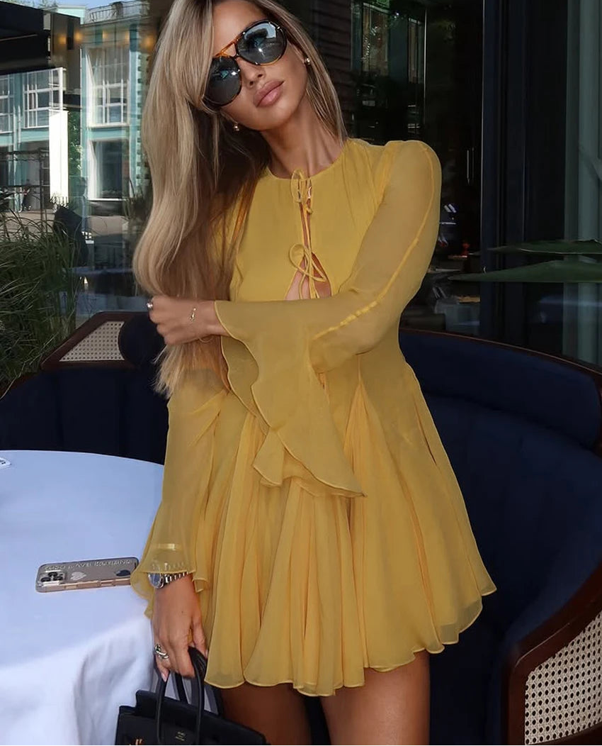 Bell sleeve empire waist yellow dress shown for bright party moments