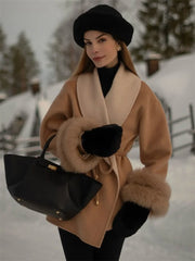 Belted women’s coat with faux fur cuffs for elegant winter layering