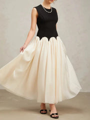 Black beige color block long dress styled for evening parties