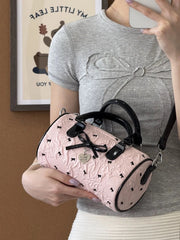 Pastel pink Y2K handbag with lace and bow details