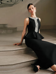 Closer view emphasizes the crystal neckline detail against the smooth bandage fabric, styled for cocktail events with sleek heels and a clutch.