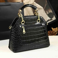 Compact faux leather handbag with crocodile embossing