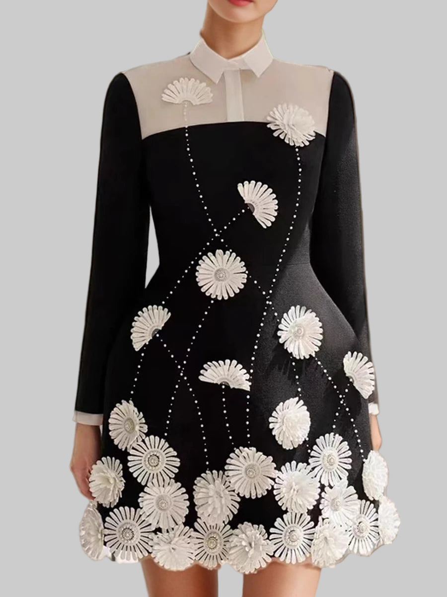 Black floral applique mini dress with white collar styled for parties