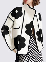 Woman wearing black flower print high-neck button coat