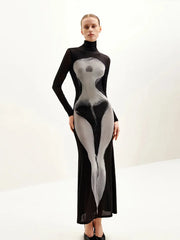 Model wearing a black and gray illusion print mesh maxi dress with turtleneck  on a white background
