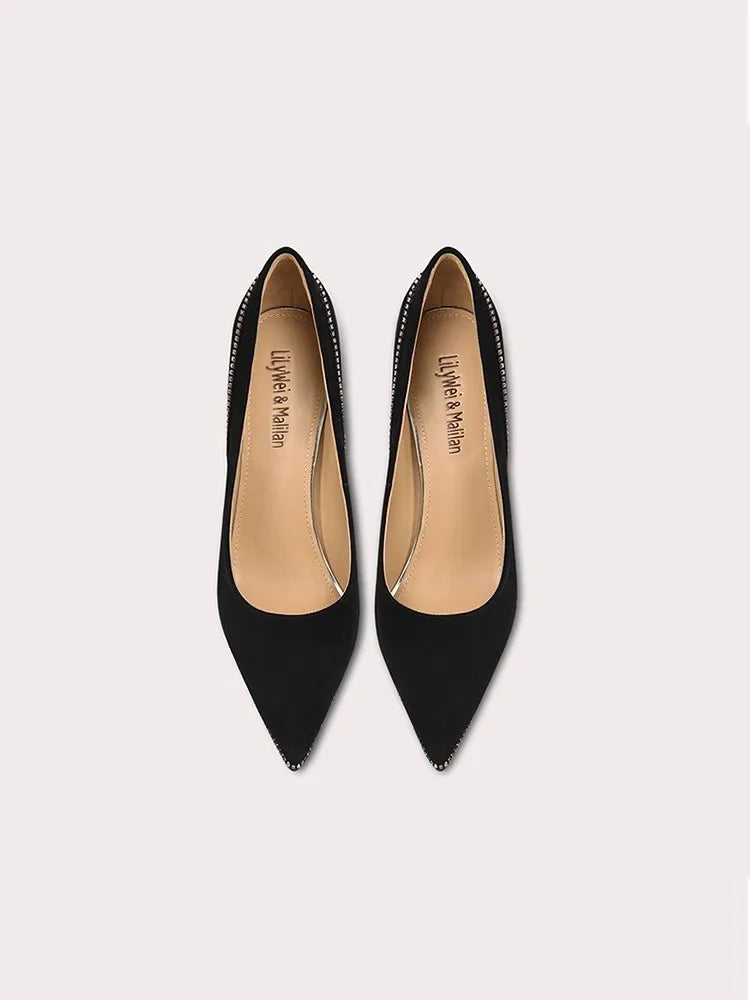 Black kid suede stiletto pumps styled for work and evening elegance
