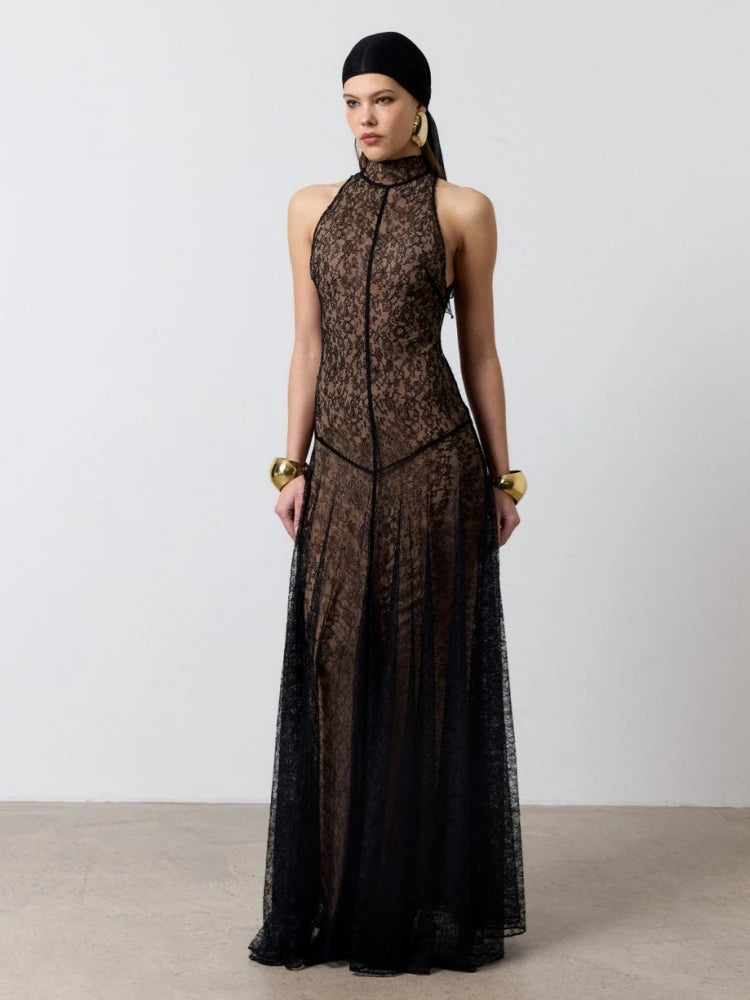 Close-up of the high neckline and lace texture across the bodice, showing the clean sleeveless cut and refined, sculpted shape.