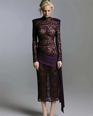 Close detail of the ruched drape at the waist and hip, showing the lace overlay and the smooth lining beneath.