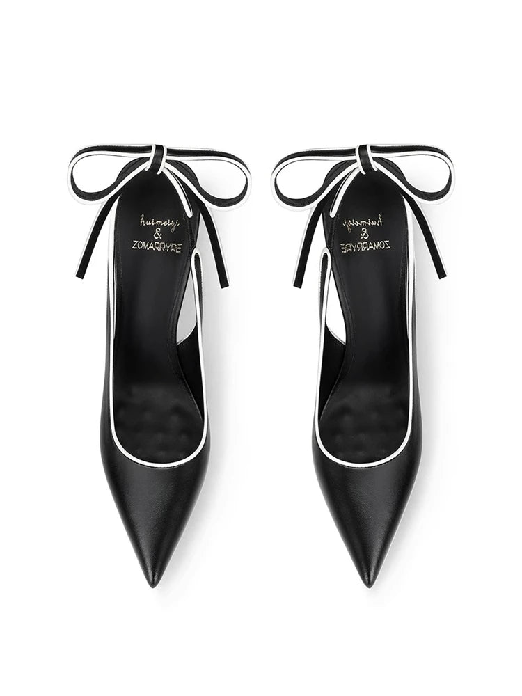 Black lace-up pointed heels with bow tie for parties and events