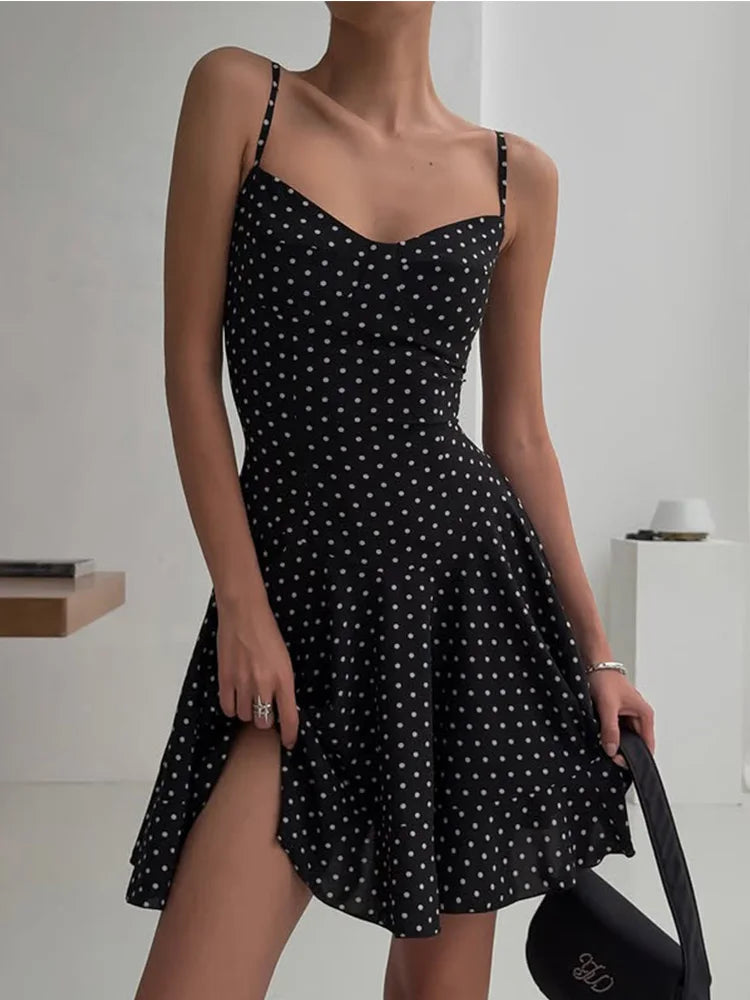 black polka dot v-neck mini dress with slim straps