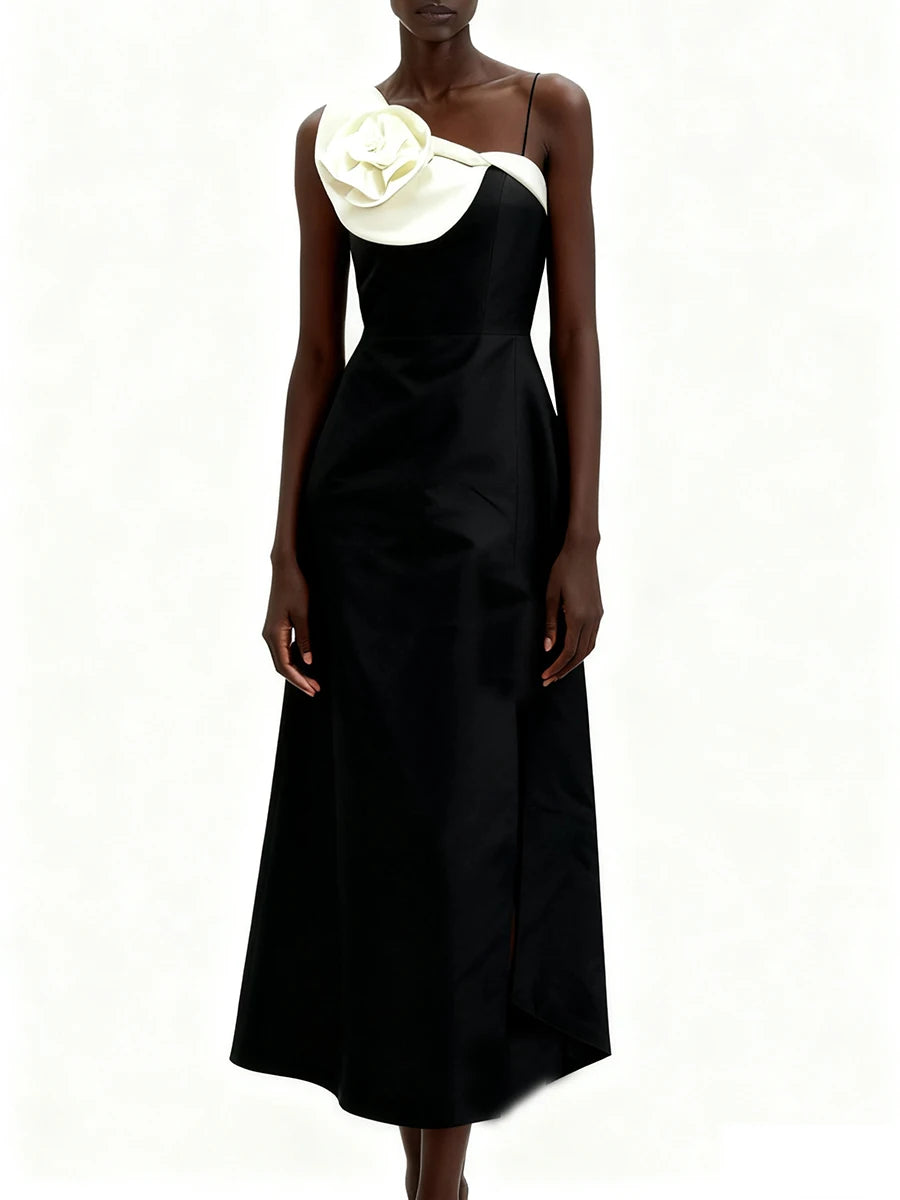 Black satin strapless midi dress with a sculpted 3D flower detail