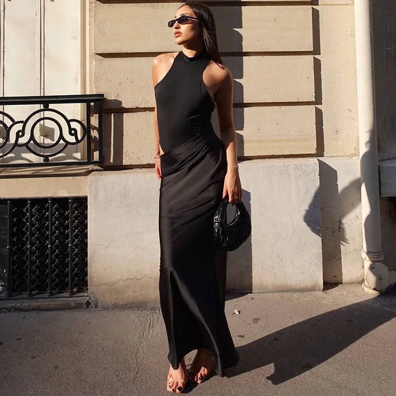 Black sheath maxi dress with hollow out detail styled for summer events