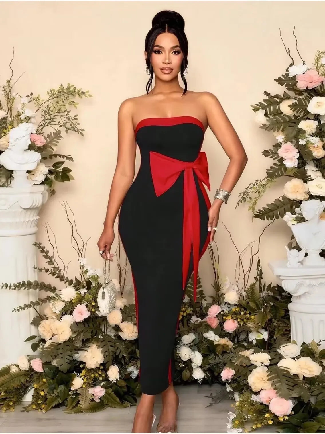 Black strapless bow dress styled for cocktail parties