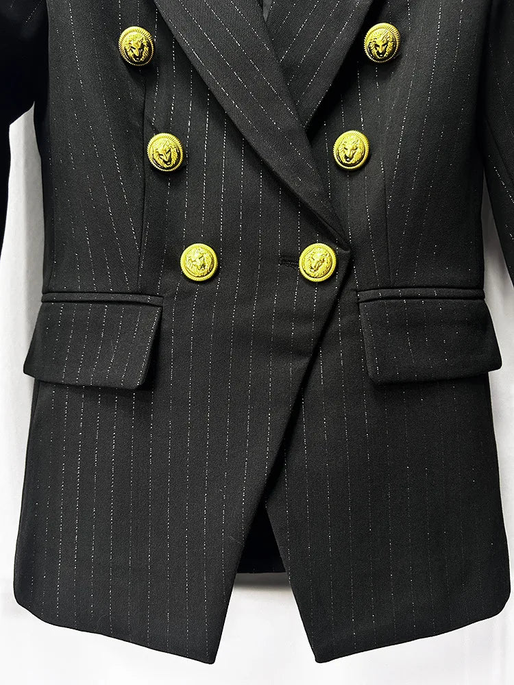 Two-piece black suit set displayed front-on, showcasing the sharp silhouette and refined tailoring details.