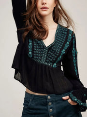 Black teal embroidered boho blouse styled with jeans