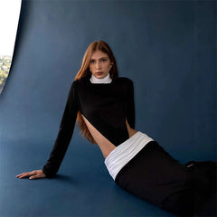 Detail focus on the ruched midsection and patchwork contrast banding, adding texture and definition through the waist.