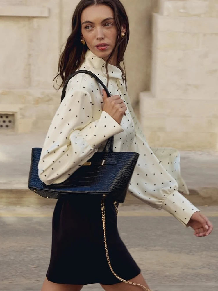 Black and white dot party shirt worn as modern streetwear city edit