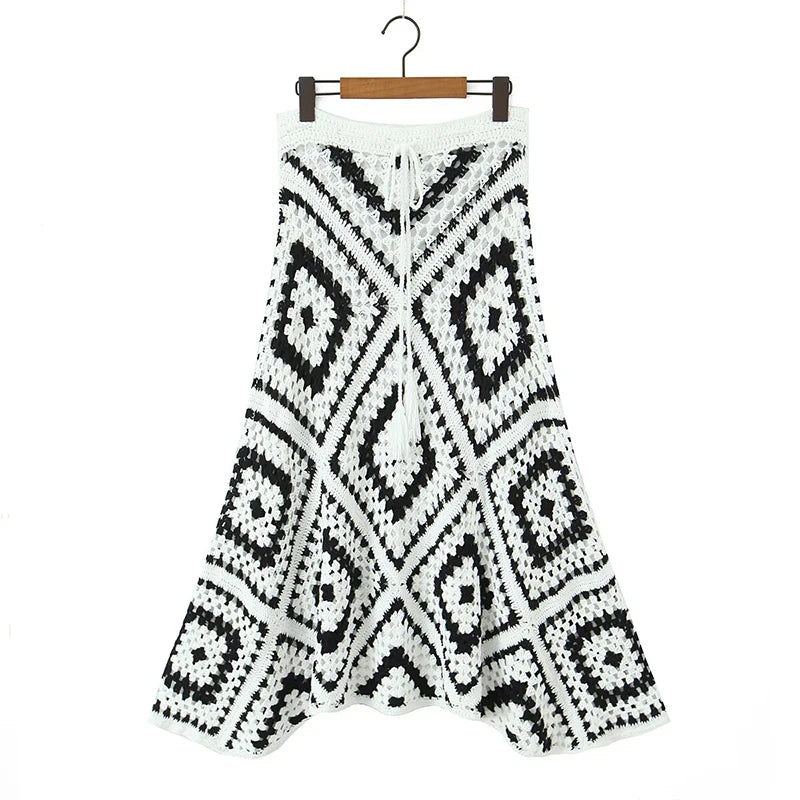 Black and white knit midi skirt styled for boho autumn outfits