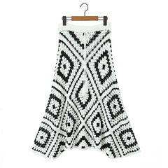 Black and white knit midi skirt styled for boho autumn outfits