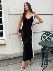 Black and white patchwork midi dress styled for events