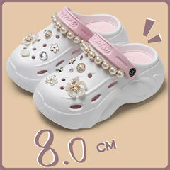 Close-up of pearl chain and thick sole design on summer clogs