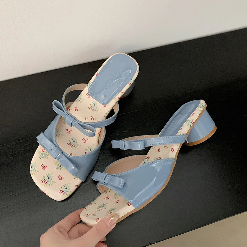 Blue butterfly-knot block heel slides with floral insole