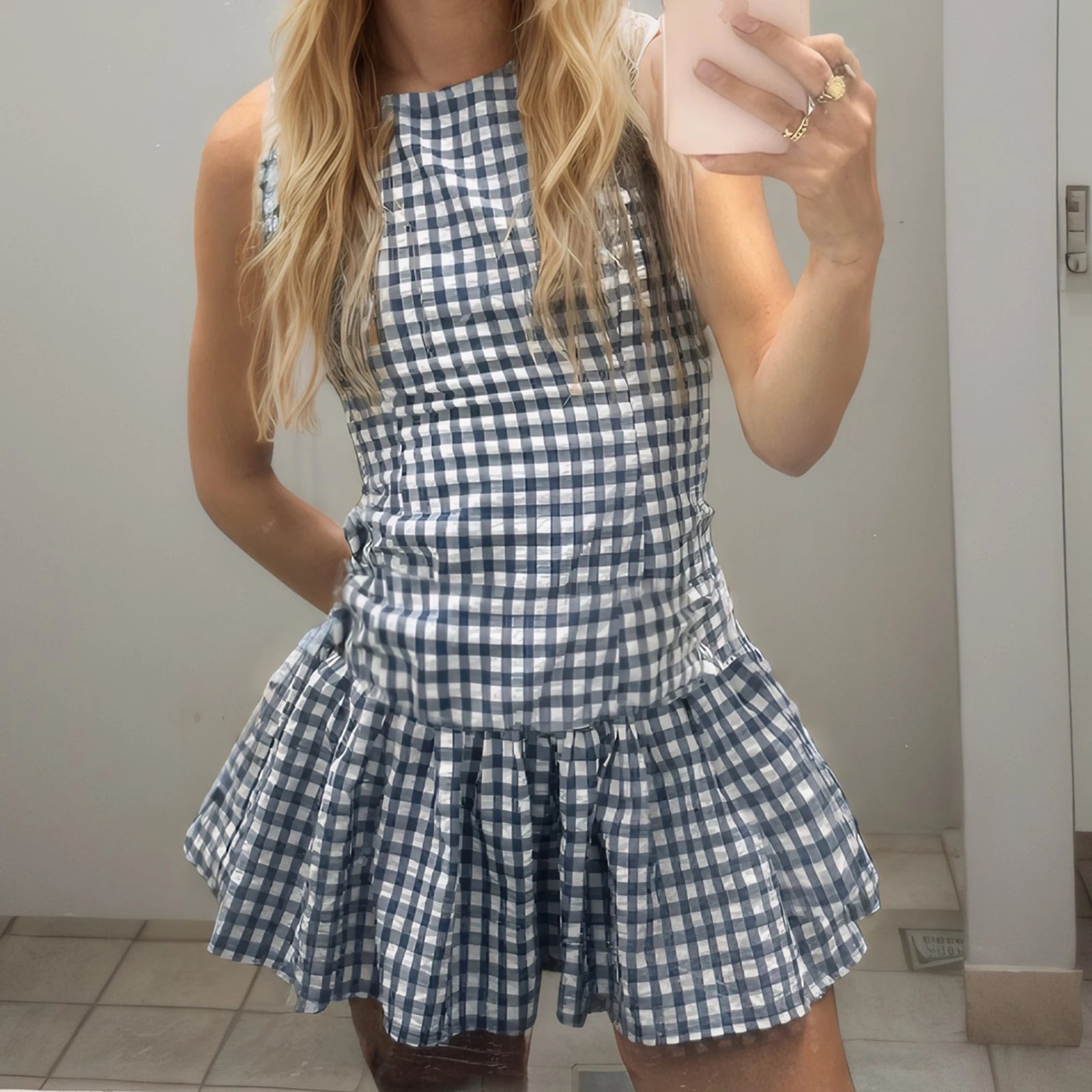 Blue checkered ruffle mini dress styled for summer picnics