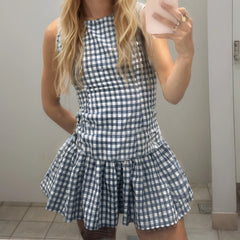 Blue checkered ruffle mini dress styled for summer picnics