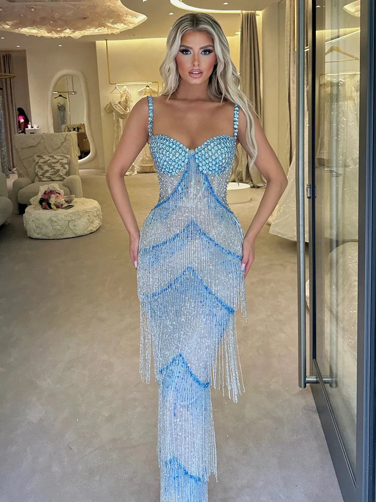 Blue crystal tassel gown styled for evening galas and formal events